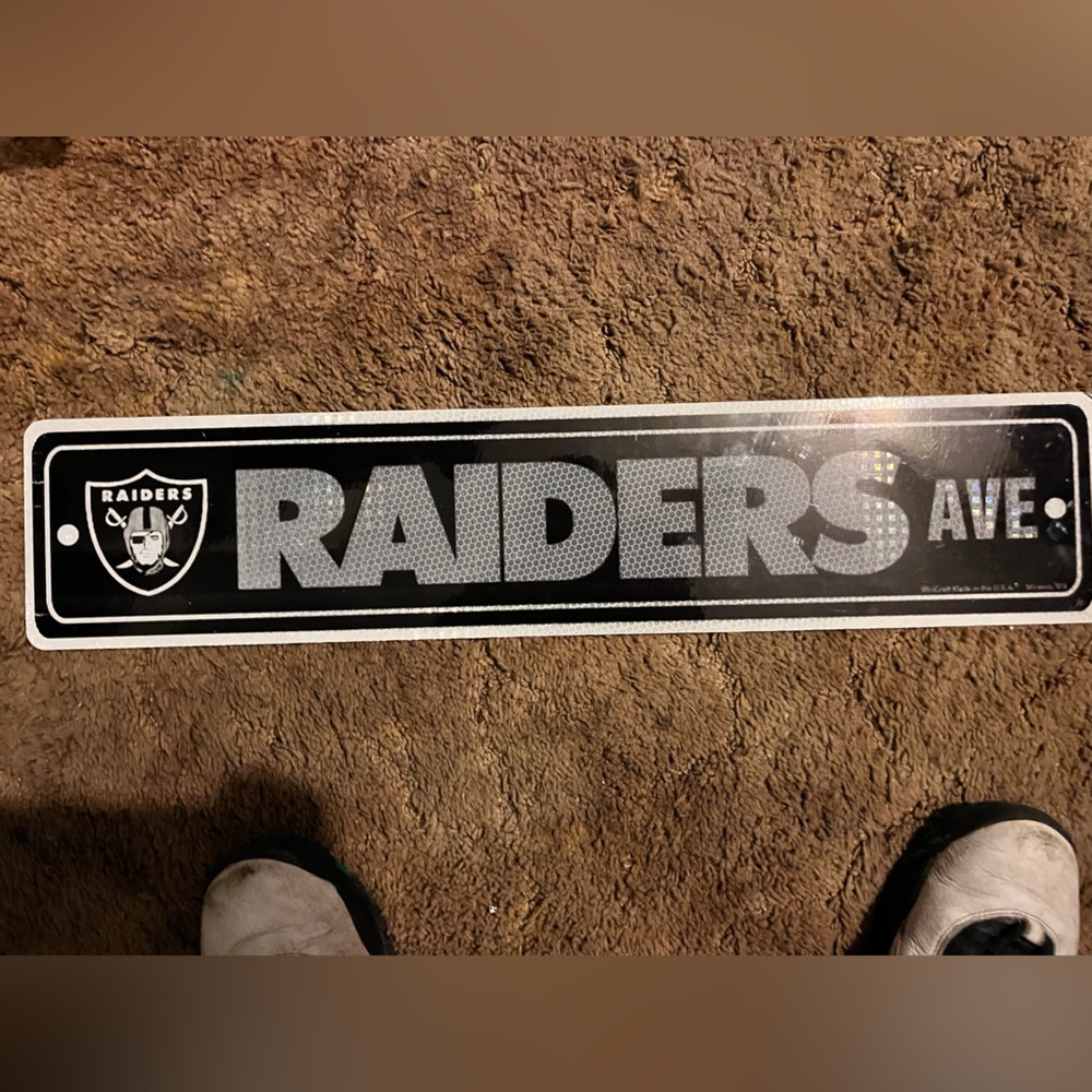 Reflective Raiders sign